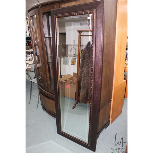 Modern framed beveled wall mirror, overall dimension including frame 68" X 26". Note: Not available 