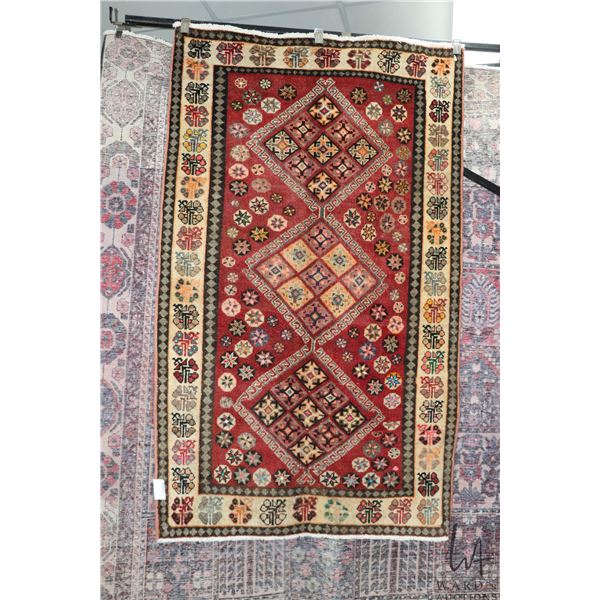 100% hand made Iranian wool carpet "Shiraz" with triiple medallion, red background, overall geometri