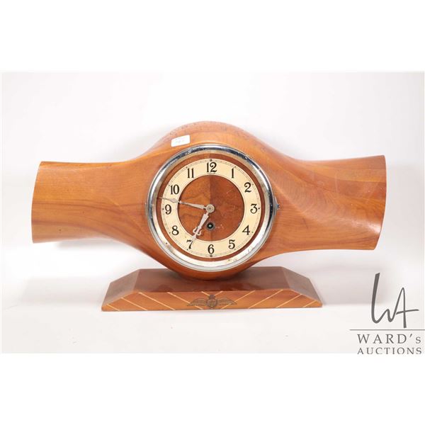 Wall clock fitted to a center section of a wooden propeller, marked Gypsy Major and labeled "FCAF", 