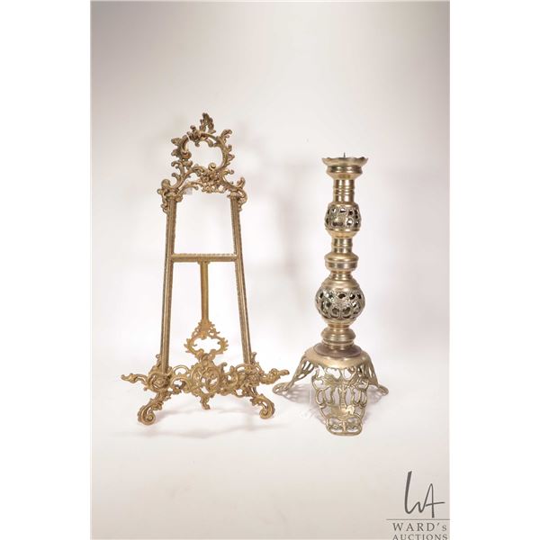 Decorative table top brass easel 21" in height and a pierce brass candlestick