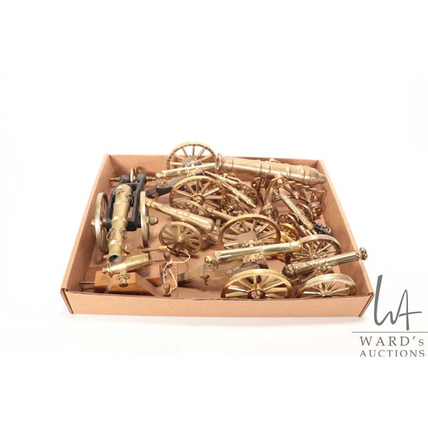 Selection of brass cannons, assorted scales and styles