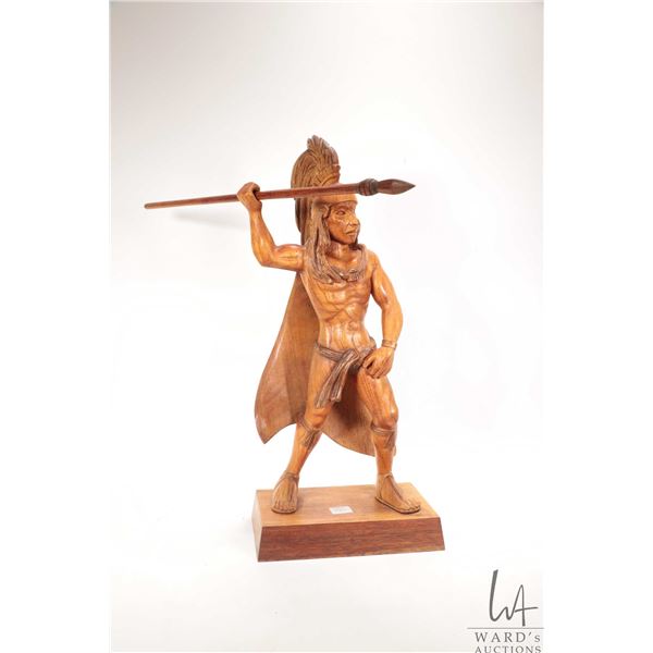 Hand carved wooden warrior with spear, 19" in height