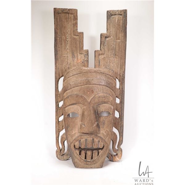 Hand carved wooden mask 25" high. Note: Not available for shipping. Local pickup only