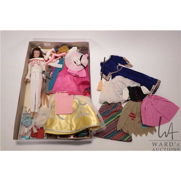 Vintage Barbie Midge doll and a selection of Barbie clothes and accessories