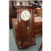 Image 1 : Antique wall clock w/ chiming movement. Note: Missing pendulum. Not working at time of cataloging . 