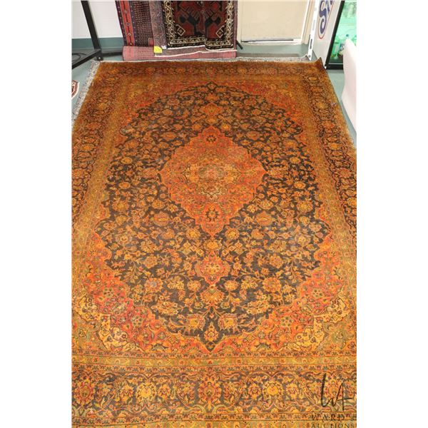 100% hand made Iranian wool carpet "Kashan" with center medallion, burnt orange background, highligh