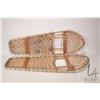 Image 1 : Two pairs of snow shoes including one unmarked wooden framed 52" in length and one aluminum framed 3