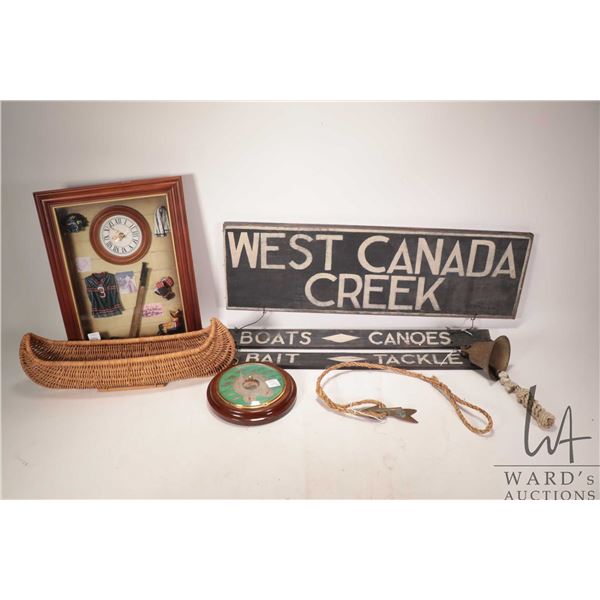 Selection of fishing motif decor including wooden sign, barometer, woven canoe, plus hockey motif sh