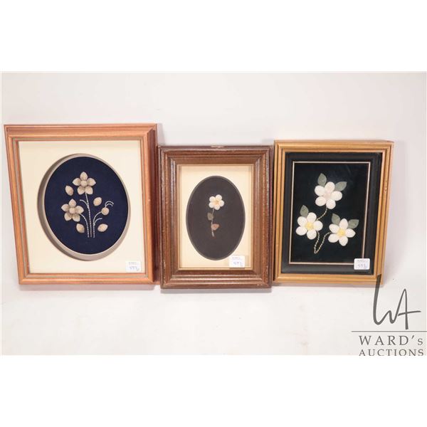 Three framed moose tufted flowers including two 9 1/4" X 7 1/4" and one11" X 9 1/2", overall dimensi