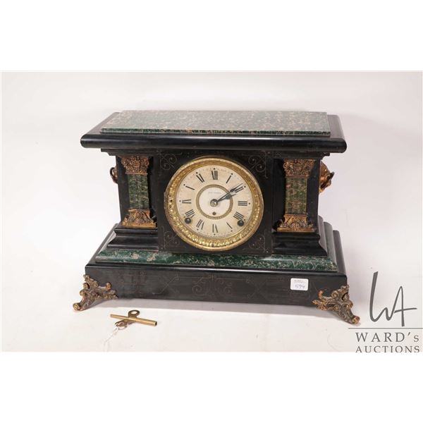 Antique Seth Thomas chiming mantle clock with faux slate and marble finish, cast column decoration a