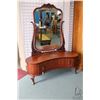 Image 1 : Antique mahogany vanity with curved front, large center drawer flanked by two curved door cupboards,