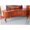 Image 2 : Antique mahogany vanity with curved front, large center drawer flanked by two curved door cupboards,