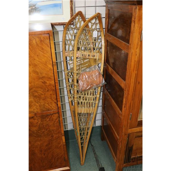 Pair of Kunah 49" snowshoes and a packaged set of snowshoe harnesses. Note: Not available for shippi