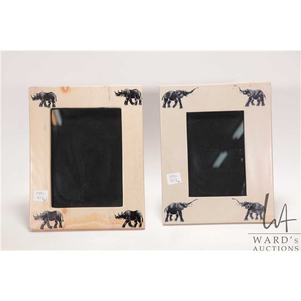 Two Kenya stone carved picture frames, each holds 4" X 6" photo and each 8" X 10" overall dimensions