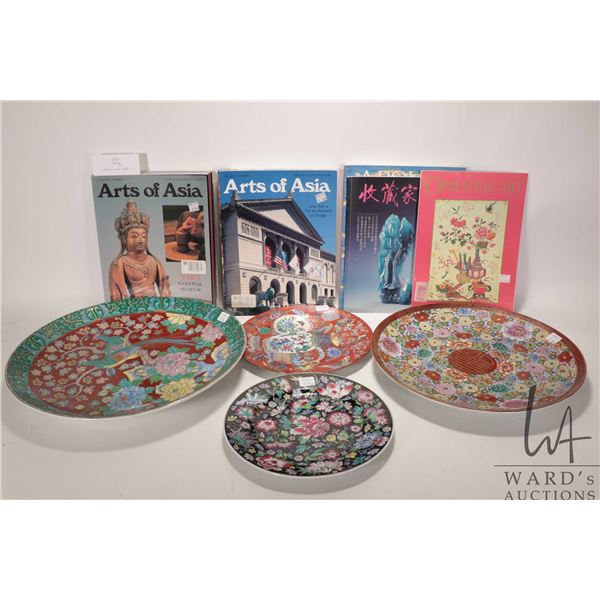 Four Chinese and Japanese chargers 10" to 16" and a selection of Arts of Asia books