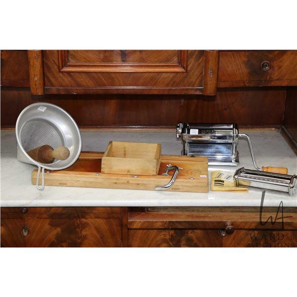 Vintage cabbage cutter and an Imperia SP 150 pasta maker