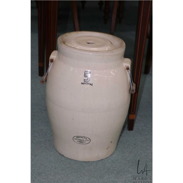 Medalta five gallon butter churn with churning stick. Note: Not available for shipping. Local pickup