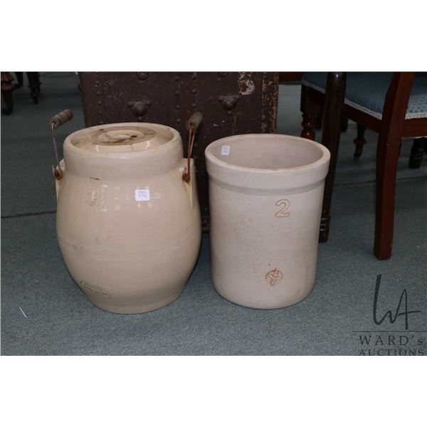 Three gallon Medalta butter crock with repaired lid and a two gallon Medicine Hat Potteries crock. N
