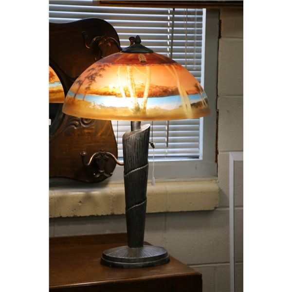 Cast metal lamp with reverse painted glass shade featuring Southwestern designs and appaloosa horses