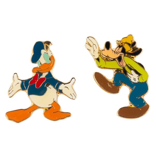 A Pair of Donald and Goofy Monogram Pins.