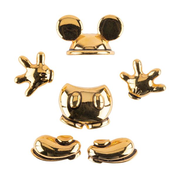 A Set of Disassembled Mickey Mouse Pins.