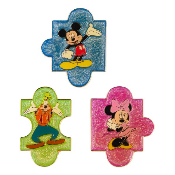 A Trio of Mickey & Friends Puzzle Piece Pins.