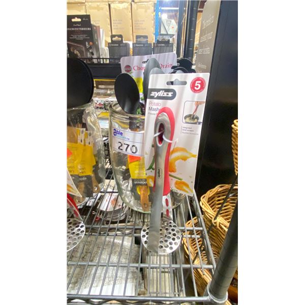 LARGE GLASS JAR WITH ASSORTED COOKING UTENSILS; SPOONS, PASTA SPOONS AND POTATO MASHER