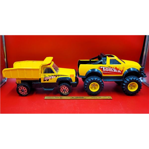 Two Toy Tonka Trucks