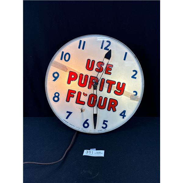 Vintage Purity Flour  Clock Lights up and Works, Has Crack on Face