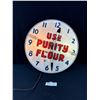 Image 1 : Vintage Purity Flour  Clock Lights up and Works, Has Crack on Face