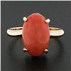 Image 2 : Vintage 14K Gold Elongated Oval Cabochon Pinkish-Orange Coral Solitaire Ring