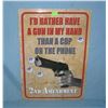 Image 1 : I'd rather have a gun in my hand then a cop on the phone second amendment sign