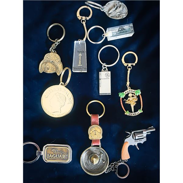 Vintage Keychain Lot – Mini Revolver, Hula Dancer, Jaguar, GE, World’s Fair