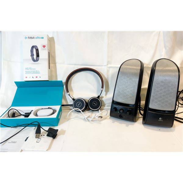Tech Lot – Jabra Headset with Charging Cord, HP Full HD Camcorder, Fitbit Alta HR, and Lapt
