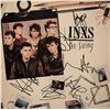 Image 1 : INXS signed The Swing album