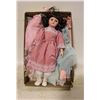 Image 1 : VINTAGE PORCELAIN DOLL W/BLANKETS & EXTRA DRESSES