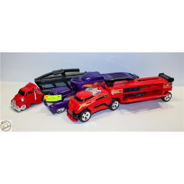 LOT OF THREE HOTWHEELS TRANSPORTER VANS