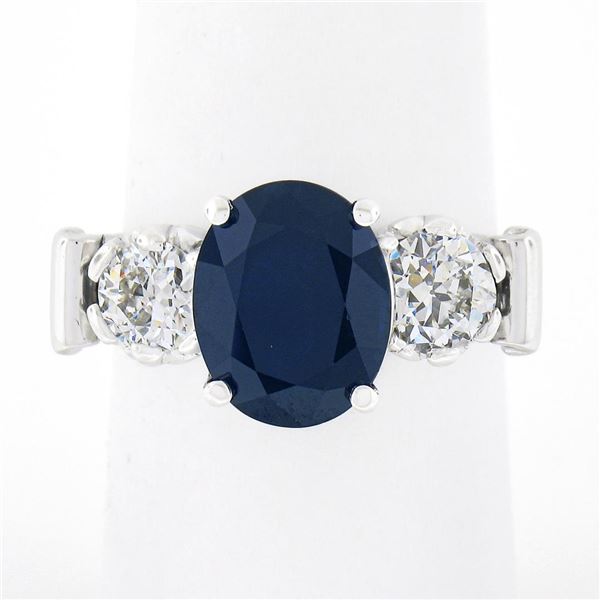 Vintage Platinum 4.95 ctw GIA Oval Dark Blue Sapphire w/ Old European Diamond Ri
