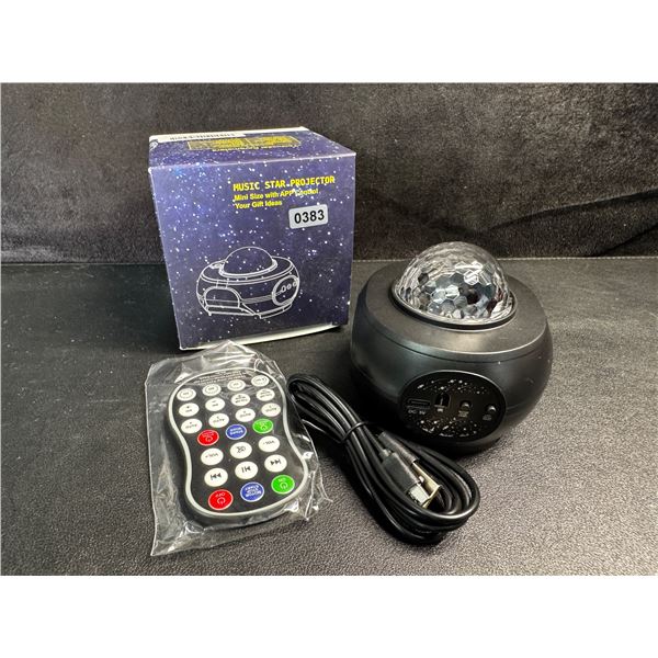 1 Mini Music Star Projector with Remote and App Control - New