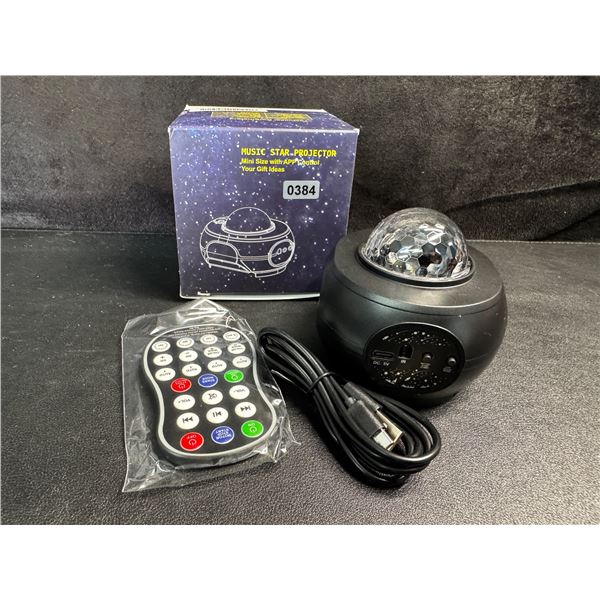 1 Mini Music Star Projector with Remote and App Control - New