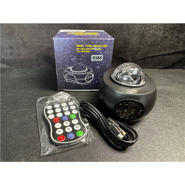 1 Mini Music Star Projector with Remote and App Control - New