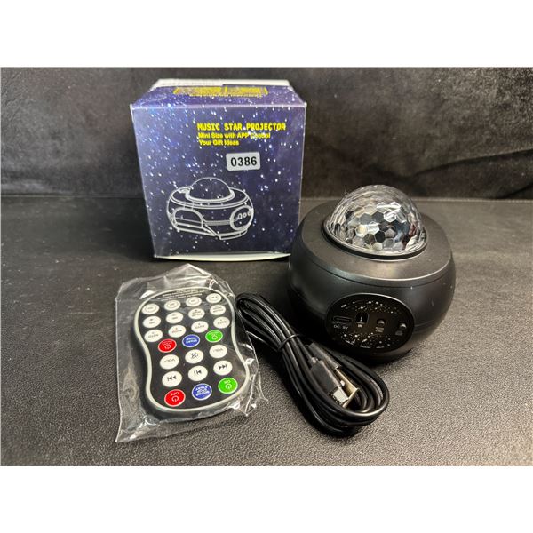 1 Mini Music Star Projector with Remote and App Control - New
