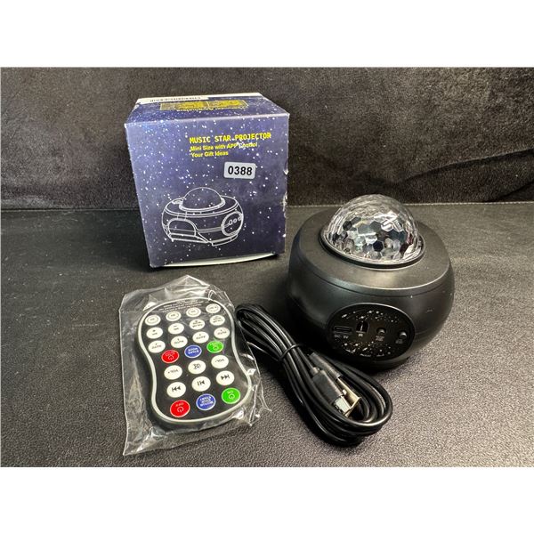 1 Mini Music Star Projector with Remote and App Control - New