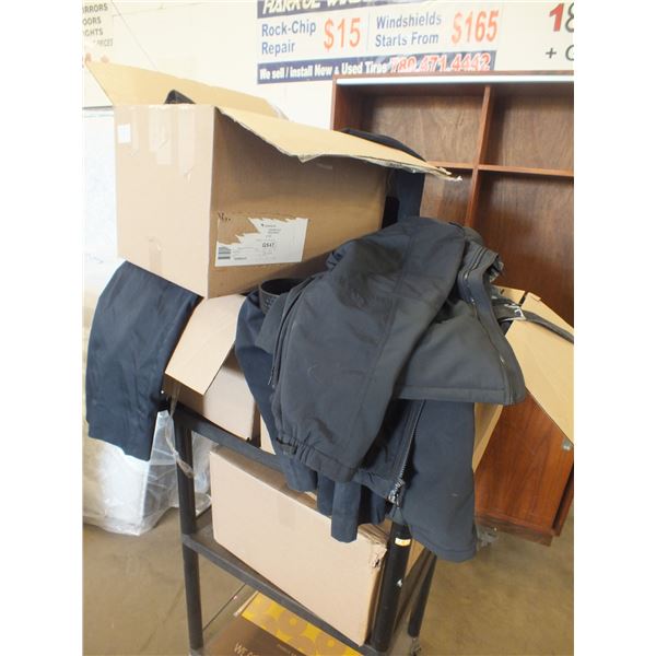 4 Boxes Of Assorted Work Pants