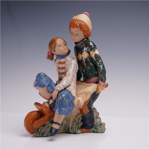 Nadal Spanish Gres Boy and Girl on Sled Figurine