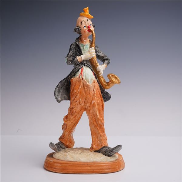Whimsical Porcelain Clown Figurine with Saxophone