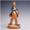Image 1 : Whimsical Porcelain Clown Figurine with Saxophone