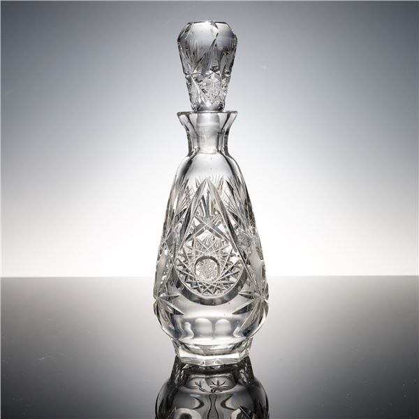 Starburst Elegance: Deep-Cut Crystal Decanter with Prism Stopper