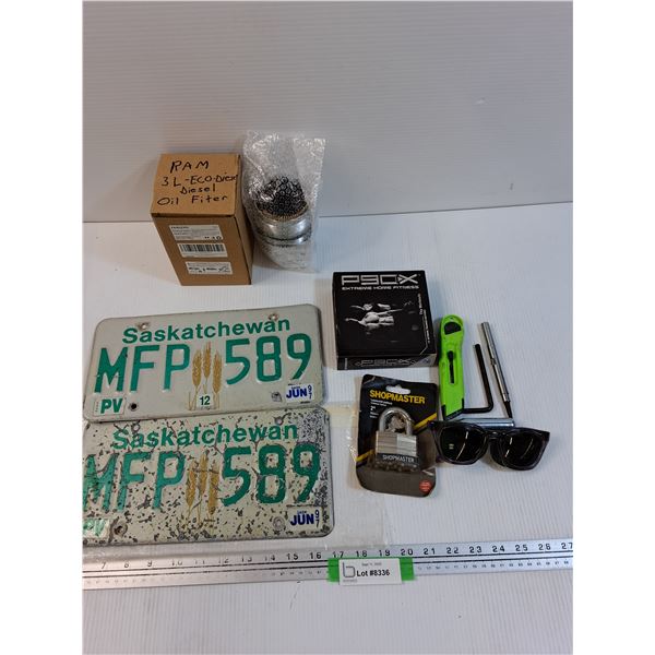Lot: (2) Saskatchewan License Plates, Dodge Ram Oil Filter, Shopmaster Lock, Misc