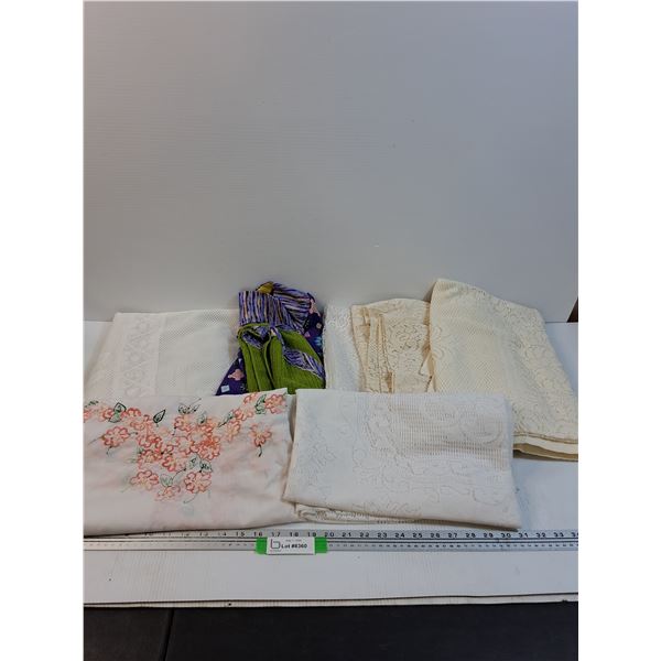 Lot: (5) Tablecloths & Apron